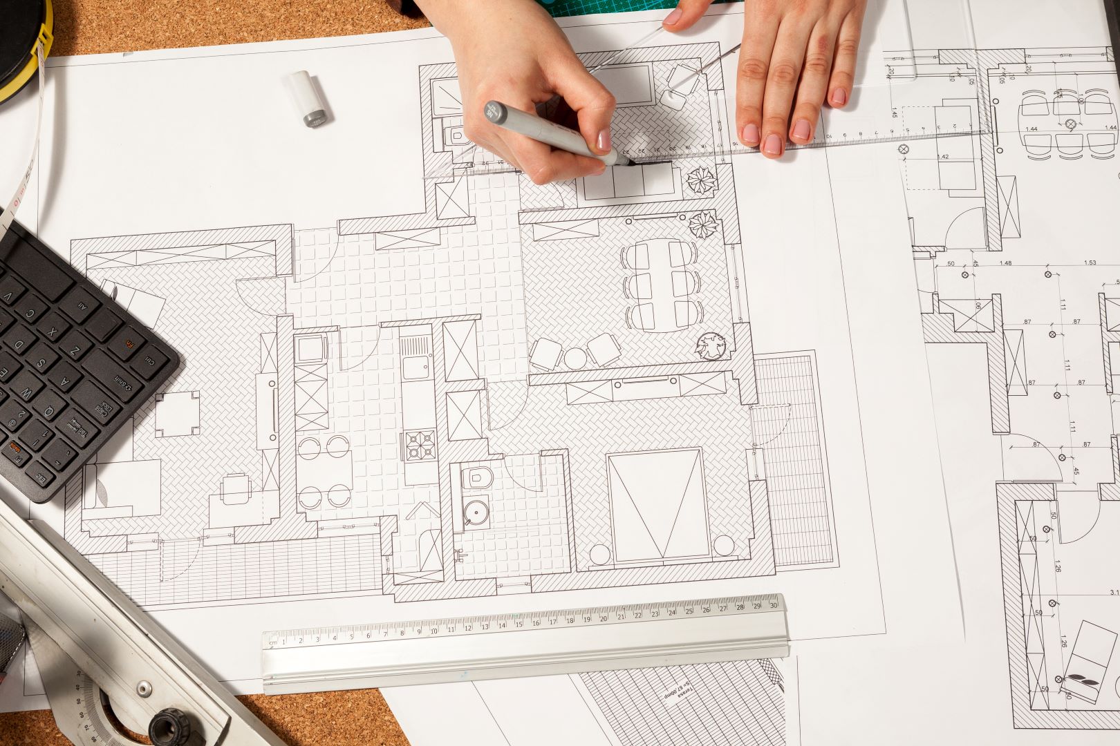 Architect Works On Blueprints 409063 3